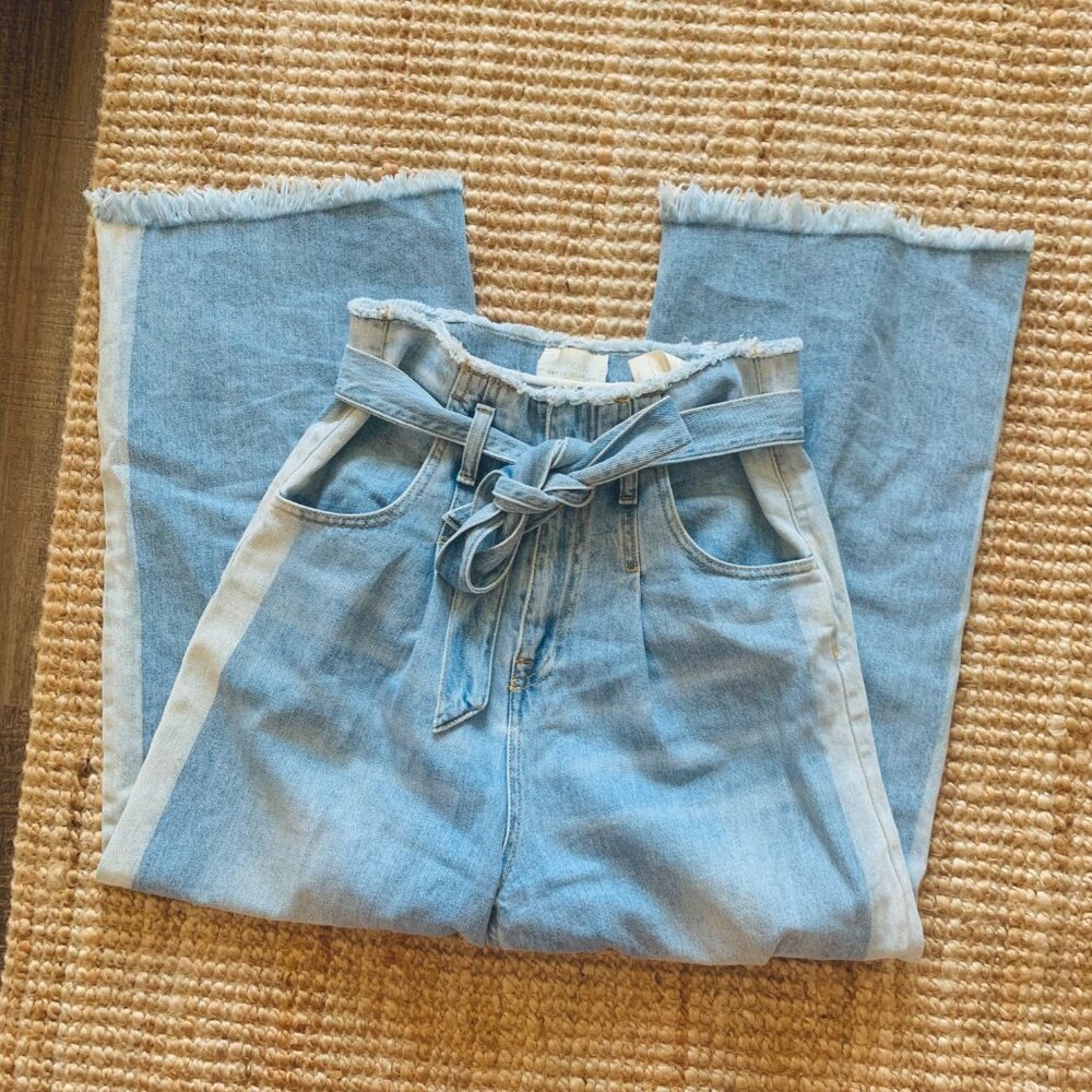 Vicolo high waisted flared raw hem jeans